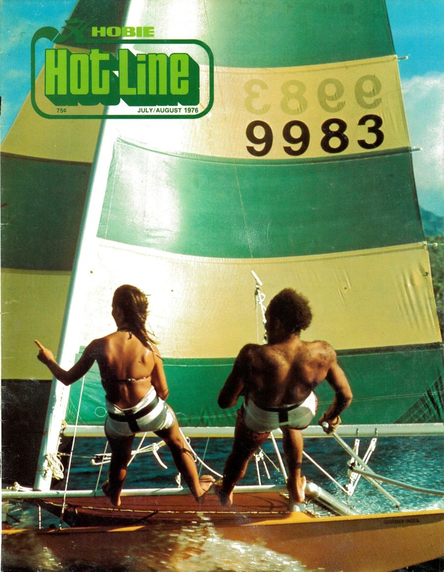 Cover of Hobie Hot Line, July/August 1976: two sailors on trapeze beneath a green and white striped Hobie 16 sail, number 9983